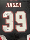 Autographed/Signed Dominik Hasek Buffalo Black Hockey Jersey Beckett BAS COA