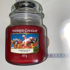 Image of Yankee Candle Scented Medium Jar Christmas Eve 65-75 Hours 411g 10.7cm x 12.7cm