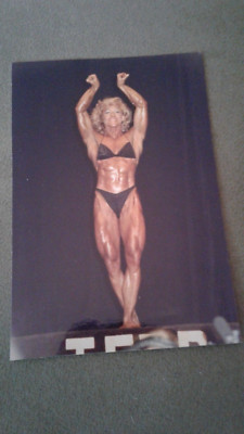 Photo of Female Bodybuilder flexing in Contest 3.5x5-Exc condition