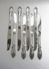INTERNATIONAL STERLING 1957 'RHAPSODY' DINNER KNIVES - LOT OF 8 KNIVES