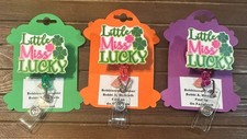Little Miss Lucky badge reels