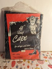 New In Bag Halloween 41" Vinyl Black Cape for all sizes.