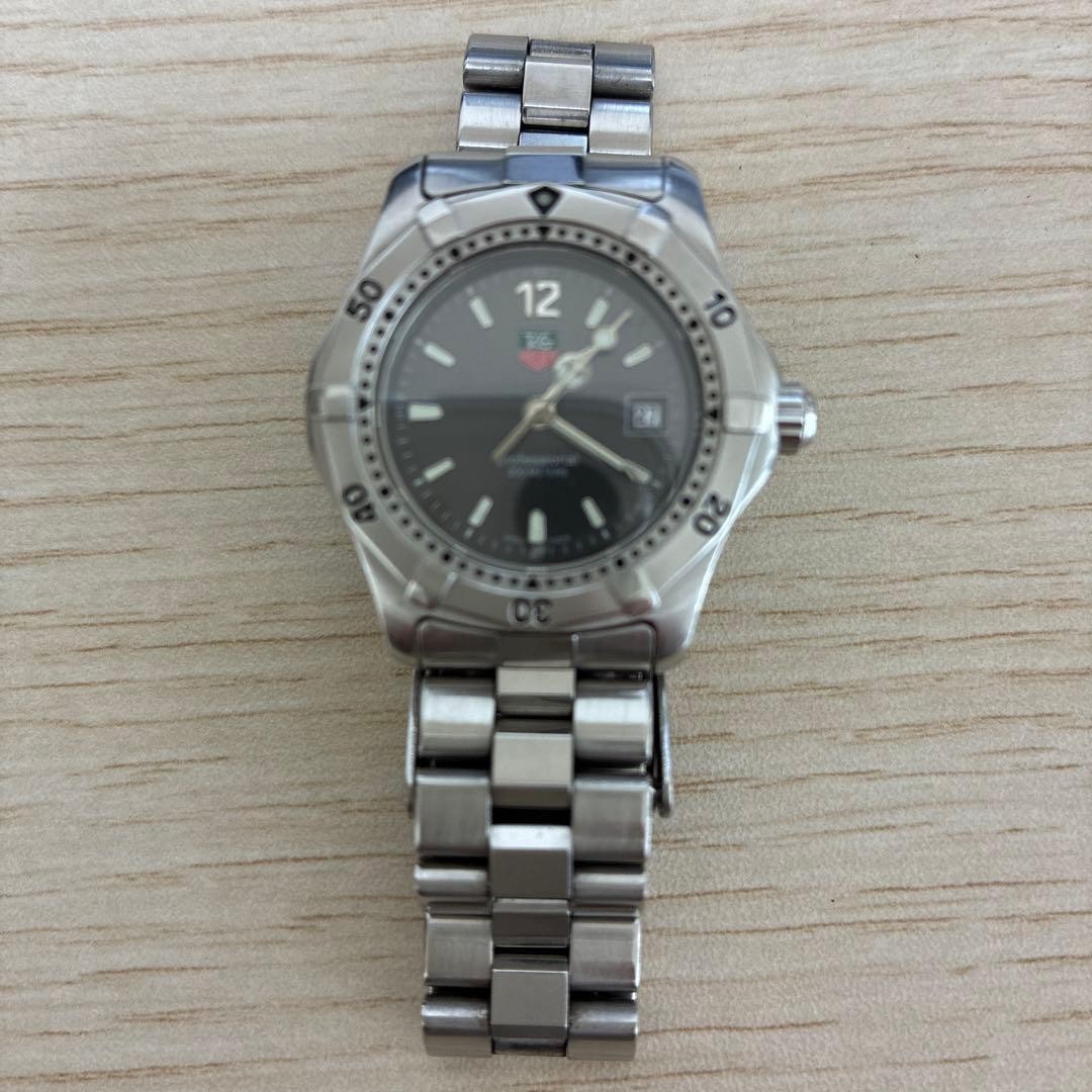 TAG Heuer Quartz Wristwatch Stainless Steel Black Dial 100m Water Resistant
