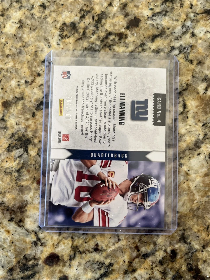 2012 Panini Rookies & Stars - Statistical Standouts Eli Manning #4 Gold /500 - Image 2 of 2