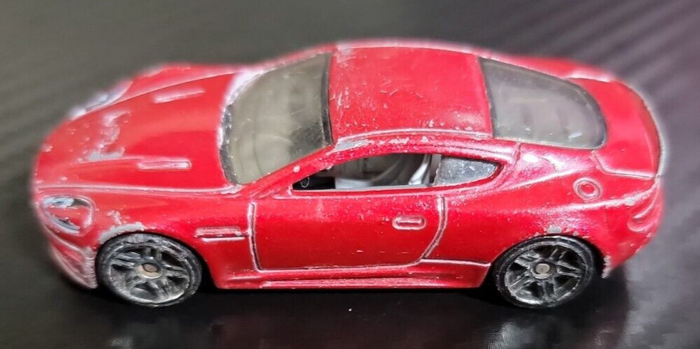 2010 Mattel R6459 Hot Wheels Burgundy Red Car