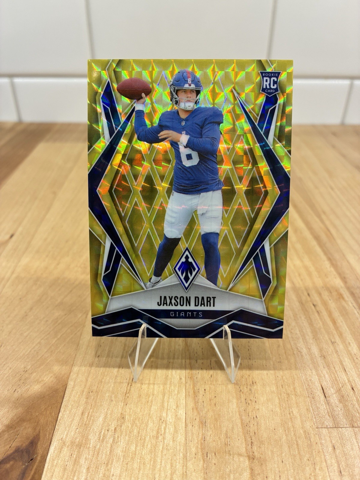 2025 Panini Phoenix - Rookies Jaxson Dart #200 Yellow Pyramids /185 (RC)