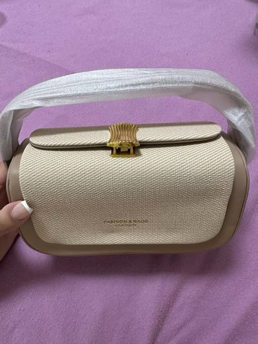 Elegant women's handbag in beige, gold clasp modern design and high quality