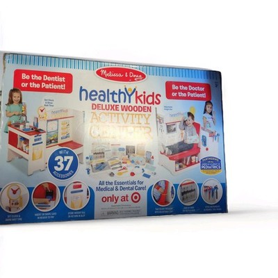 Melissa & Doug Deluxe Wooden Doctor/Dentist Wellness Center