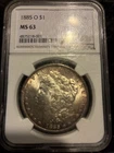 1885 O $1 MORGAN SILVER DOLLAR NGC MS63 Heavy Toning/Case Is Scratched