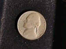 1960-D Jefferson nickel Die Error Bar over O of 60. Almost Uncirculated. 
