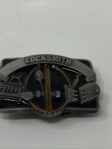 Vintage silver and black locksmith-themed belt buckle