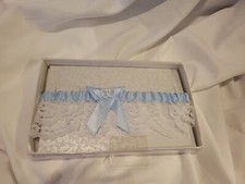 Brand New Sealed In Box, White Blue Bridal Wedding Garter With A Blue Bow