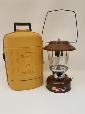 Vintage 80s brown Coleman lantern #275 Jan 1983 in yellow carrying