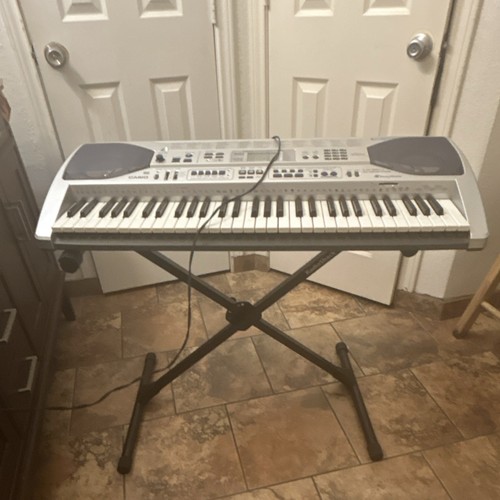 Casio LK-90TV 61-Key Electronic Keyboard Silver w/ Stand, Power Adapter