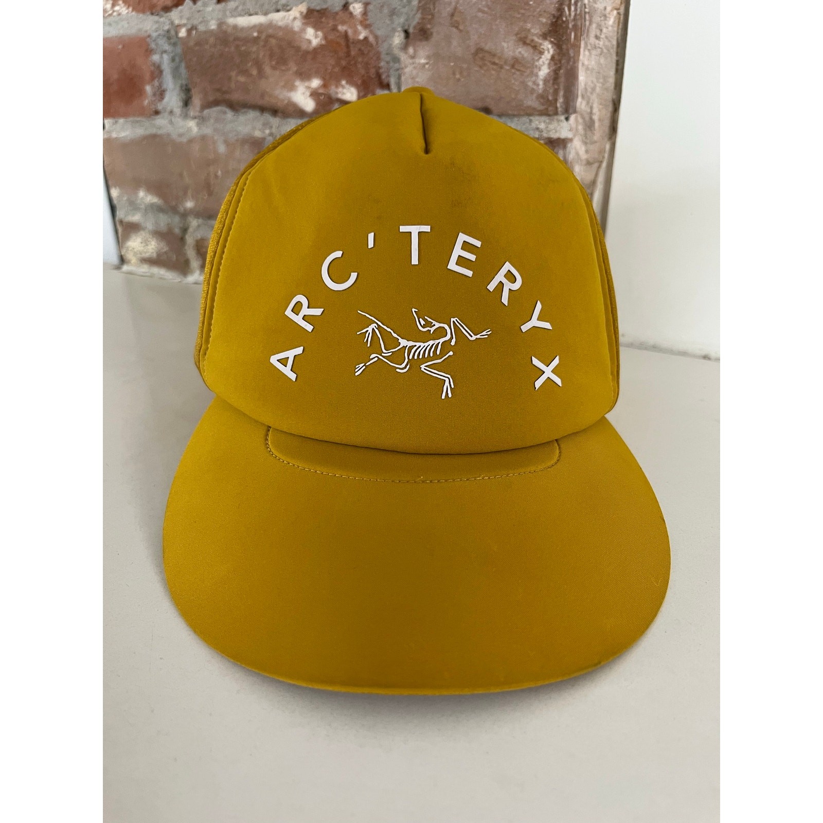 Cappello da camionista Arc'teryx SnapBack in rete giallo dorato taglia unica