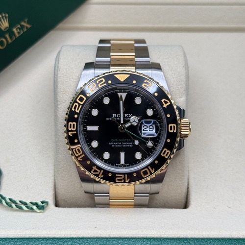 Rolex GMT-Master II Black Dial Two Tone Yellow Gold Black Ceramic Bezel Oyster