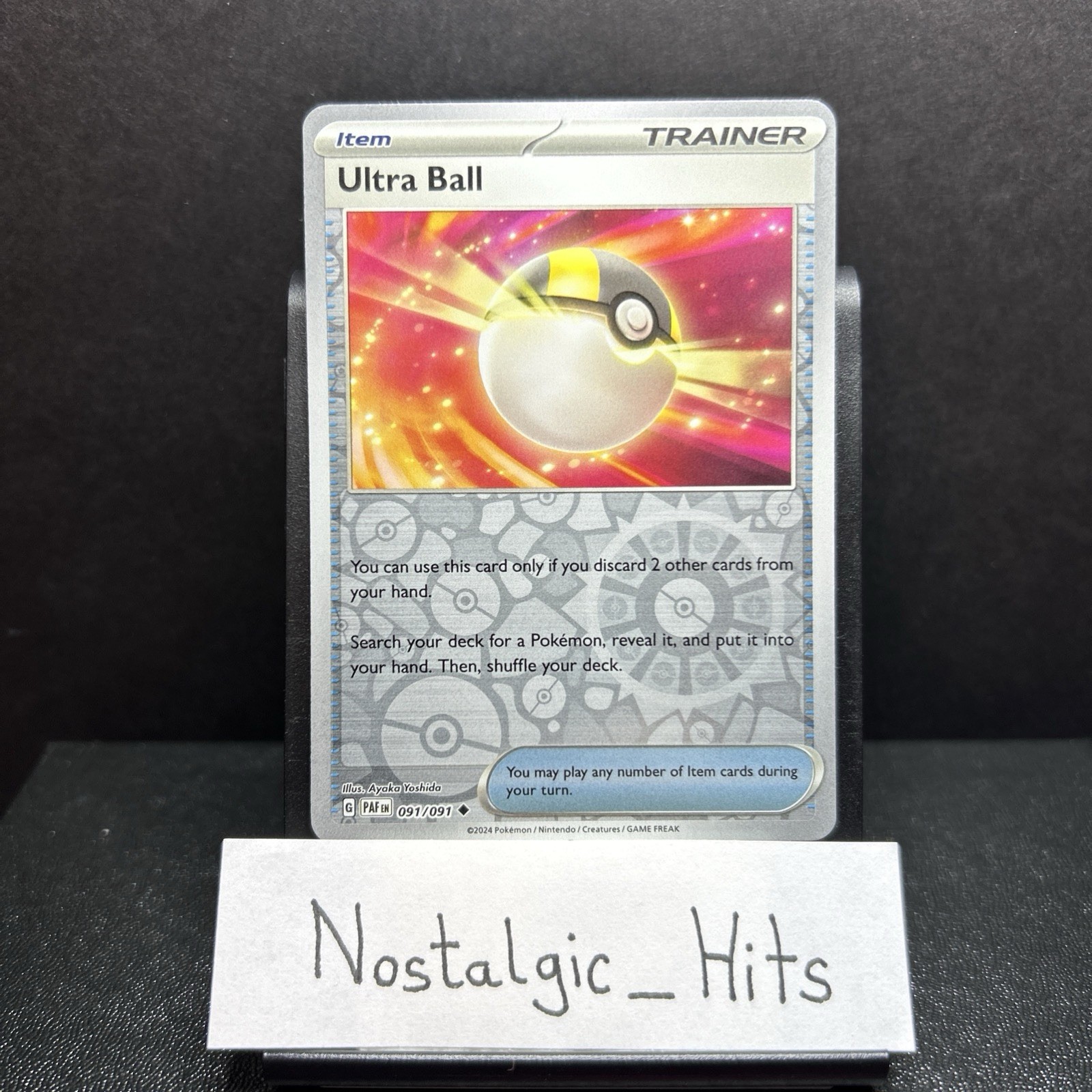 Ultra Ball 091/091 Paldean Fates Reverse Holo NM-LP
