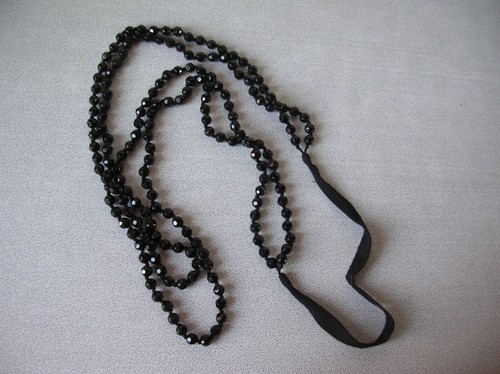 Collier perles noires et attache en or 18k