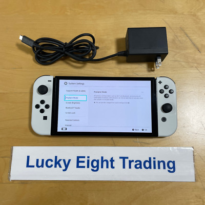 任天堂Switch2024年モデル Nintendo OLED Model Switch with White Joy-Con, 7-inch OLED Screen