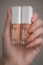    HYDRATING LIP OIL DUO     Glass-Smooth Shine. Plush Comfort. Zero Stick.  