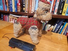 VINTAGE 1950'S REMOTE BATTERY OPERATED CLOTH COVERED POODLE DOG W/ LIGHTED EYES
