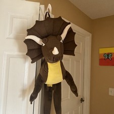 Dinosaur costume well made gives the illusion you  re riding a dinosaur