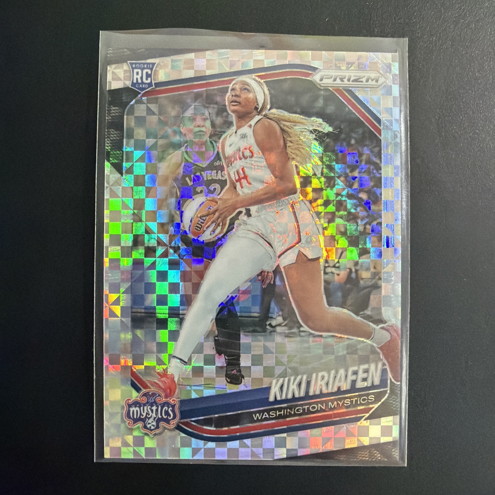 2025 Panini Prizm WNBA #72 Kiki Iriafen Checkerboard Prizms - SP