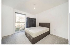 The Queen Size Grey Storage Bed Frame With Mattress by David Phillips, UK