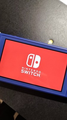 Nintendo Switch Lite - Inkl. Spiel Lila Zustand: Sehr Gut