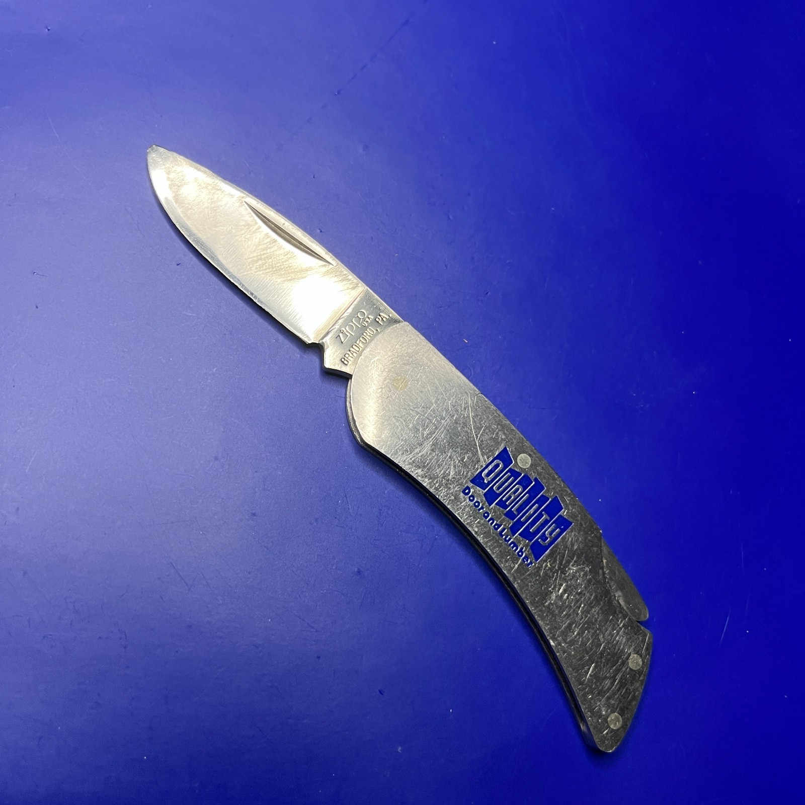 ZIPPO FOLDING POCKET KNIFE "Quality Door and Lumber"