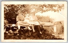 Vtg B&W Snapshot Women & Baby On Logs Casual Hats Outdoors 1920s