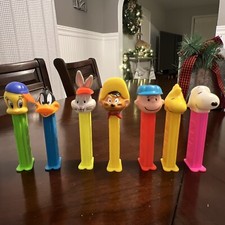 pez dispensers lot Of 7, Speedy , Snoopy, Tweety And More