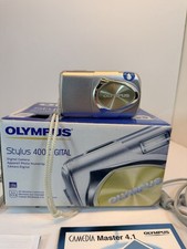 Olympus Stylus 400 4MP Digital Camera w/ 3x O...