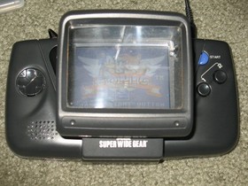Sega Game Gear Set: Console, TV Tuner, Case, Battery Pack, Power Supply, 2 Games