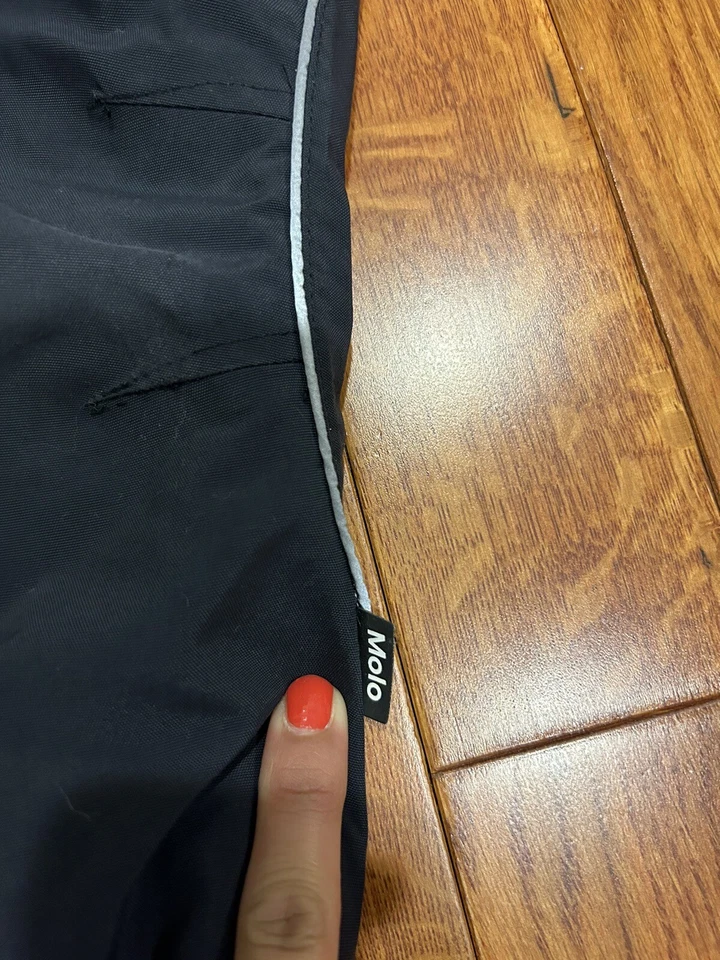 Pantalones de esquí/nieve MOLO para niños y niñas negros con estrellas blancas y forro polar talla 10 Foto 3 de 4