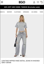 LOW RISE RIPPED KNEE DETAIL JEANS IN WASHED GREY DENIM