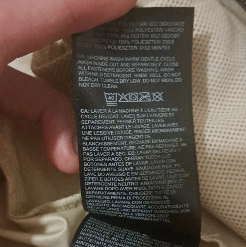 The North Face Veste coupe-vent à capuche homme S noir/beige zippée NF0A82R9 - Photo 4/4