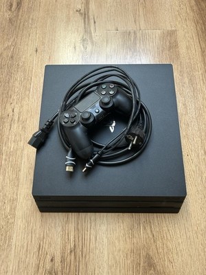 Sony PlayStation 4 Pro, 1 TB, Schwarz, Inkl. 1 Controller, 4 Spiele