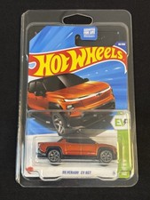 2025 MATTEL HOT WHEELS SILVERADO EV RST 88/250 CHEVY EV 6/10 ORANGE W/ PROTECTOR