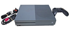 Xbox One S 500GB in space grey with a black wireless controller
