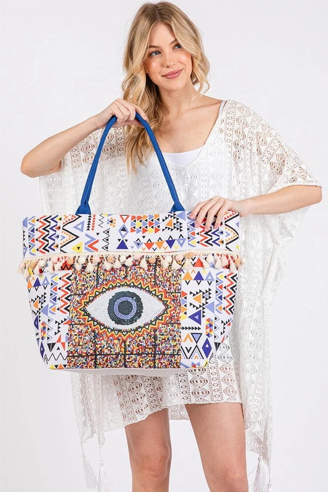 Bolso de Mano de Verano Anthropologie Estilo Mal de Ojo Estampado Boho Pom Pom Borla Bolso de Playa Foto 4 de 4
