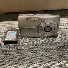 Olympus Stylus 1000 10MP Digital Camera with Digital Image Stabilized 3x Optical