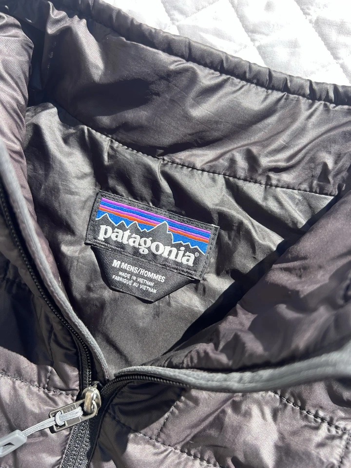 Chaleco Acolchado Patagonia Para Hombres Negro Nano Puff Aislado Talla Mediana Logo Matemático Foto 2 de 4