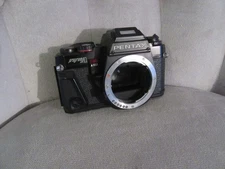 Pentax Program A  Selling for Parts Body is Very Clean but not Powering On