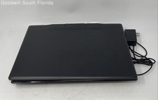 Black Portable TV  DVD Player With Charger DC 9-12V/1.5-2A Not Tested