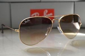 gold and brown ray bans