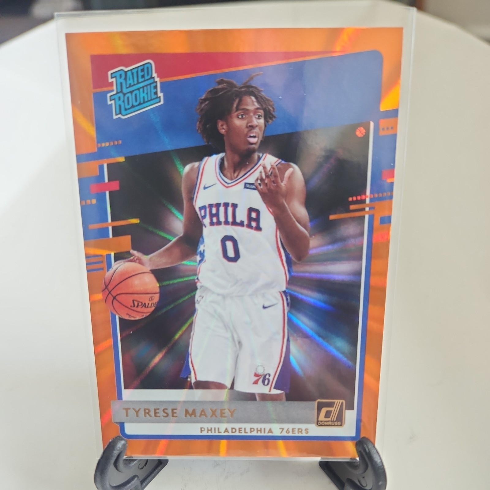 2020-21 Panini Donruss - Rated Rookies Tyrese Maxey #211 Orange Laser (RC) 76ers