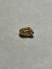 ALASKA GOLD NUGGET .63 GRAMS NICE 4936.57 per troy oz
