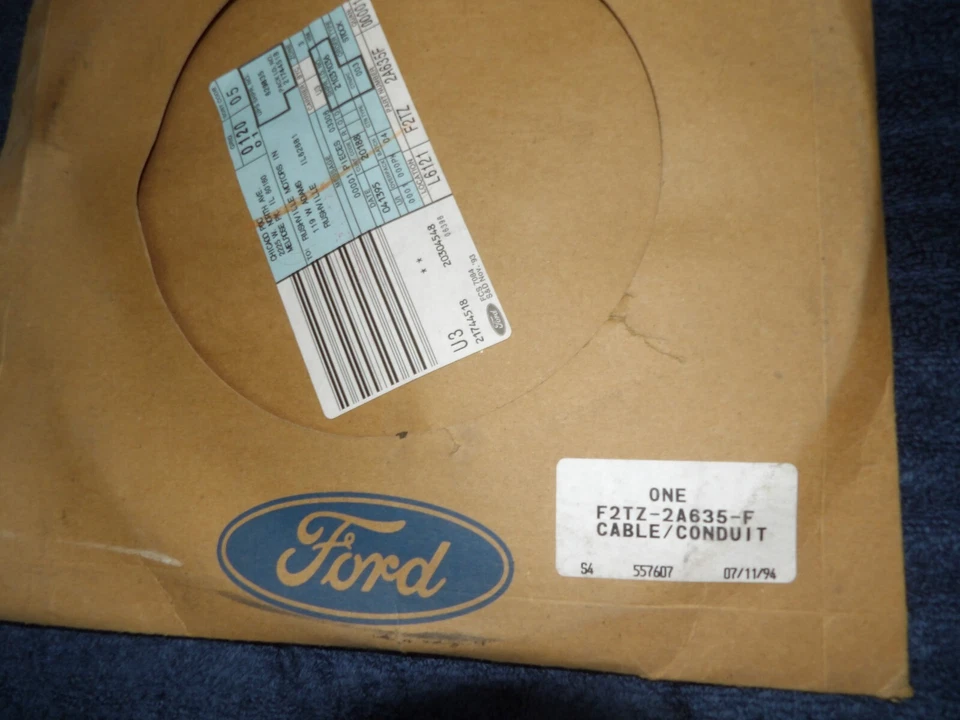 Ford F150 Bronco 1985-1996 NOS LH cable de freno de estacionamiento trasero desde 11/1984 Foto 2 de 4