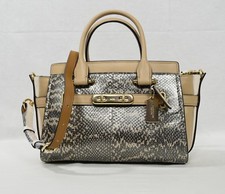 NWD Coach 24113 Swagger 27 In Pearlized Snakeskin. Platinium Multi-Color 650